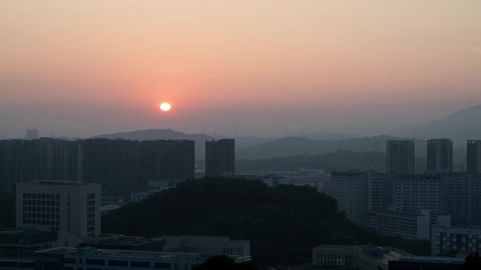 4K太阳从城市地平线升起延时摄影