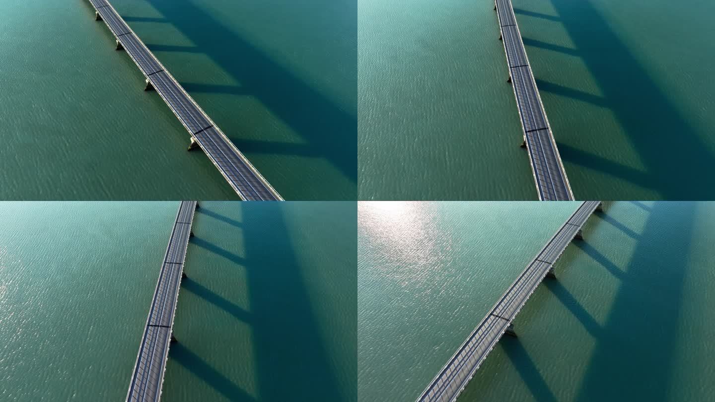 蓝绿色海水上的桥梁，城市基础设施，汽车道路。冰岛美丽的抽象风景。