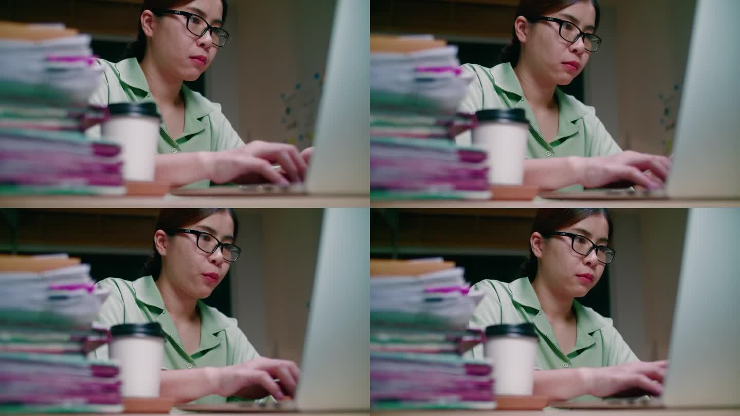 亚洲自由职业女性专注于笔记本电脑的工作类型