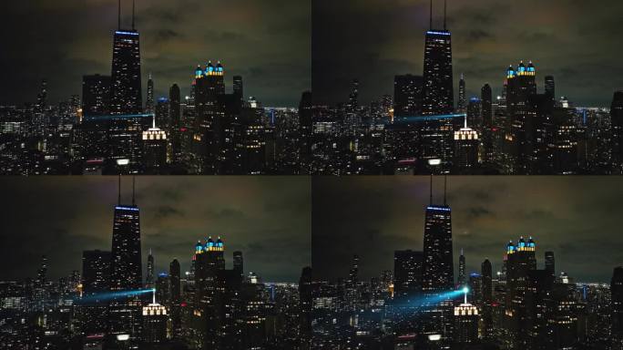 美国多云的芝加哥，静态无人机拍摄的夜晚点亮的街道天际线