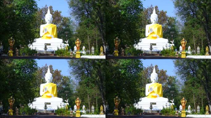 一尊巨大的白色佛像坐落在泰国那空寺
