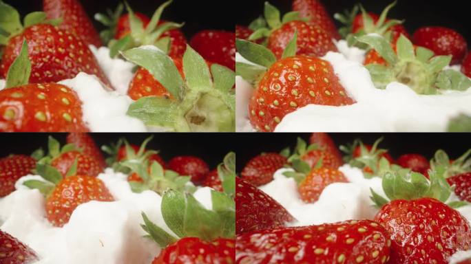 草莓散落在鲜奶油层上。多莉滑块极端特写。