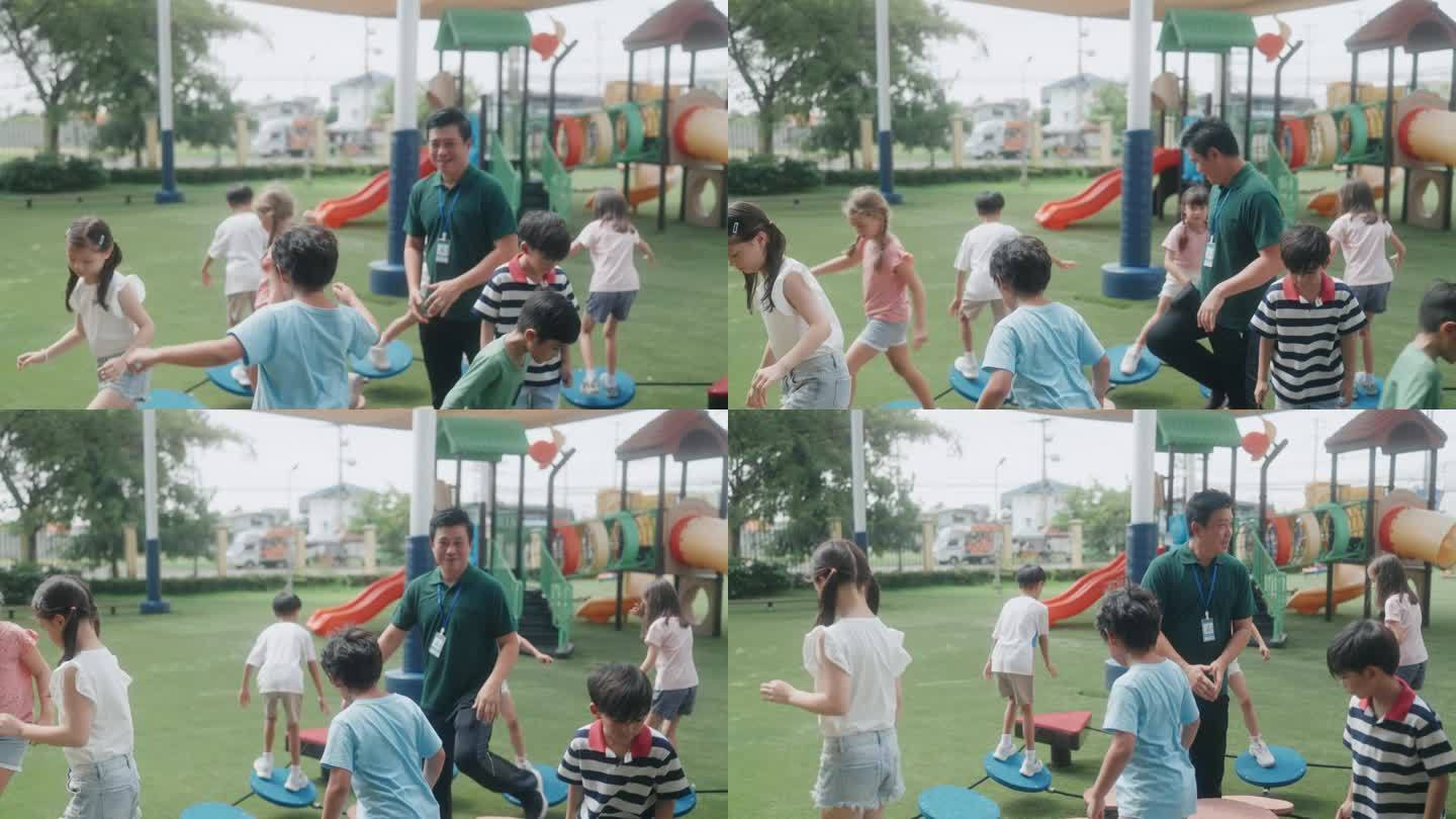 幼儿园的活动时间:孩子们和老师一起享受运动。