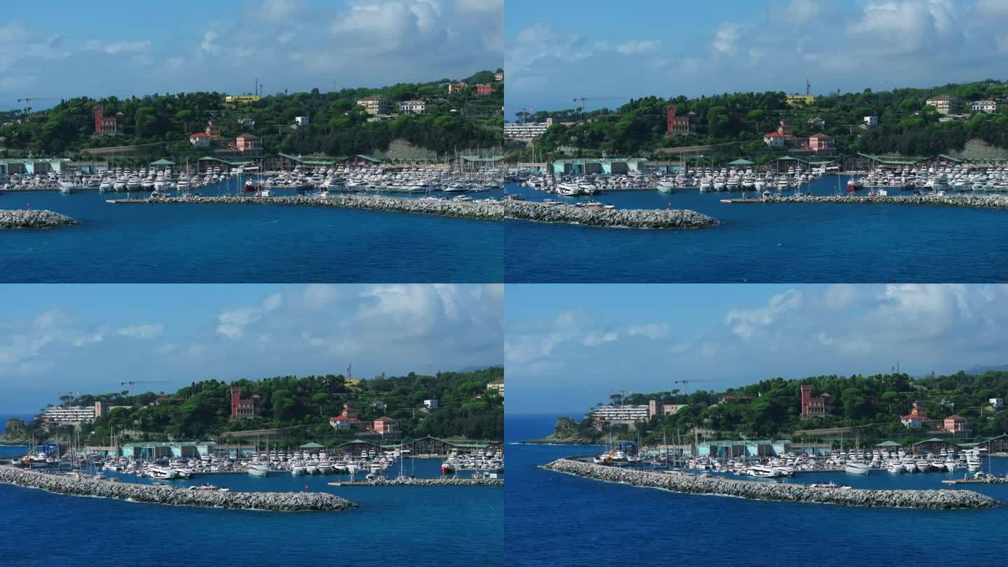 意大利利古里亚地区的瓦拉泽镇，当地港口有豪华游艇和私人船只。无人机航拍图
