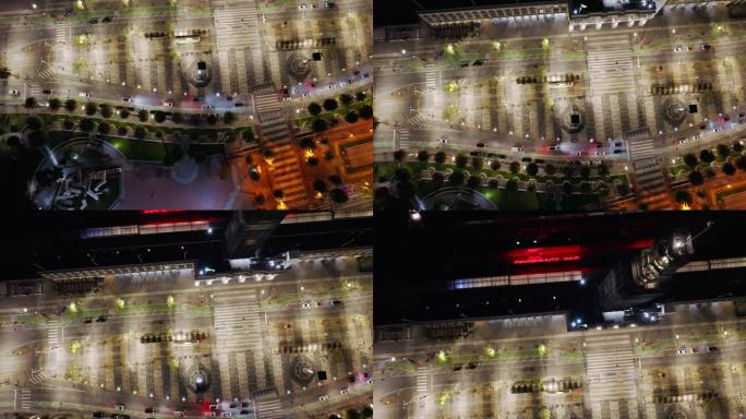 夜间，无人机在英巴卡德罗和渡轮大厦上空自上而下飞行