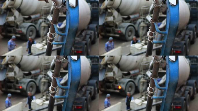 混凝土泵送机在施工现场进行混凝土浇筑工作。