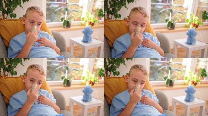 疲惫的哮喘高加索男孩，坐在沙发上使用雾化口罩，在家庭治疗期间