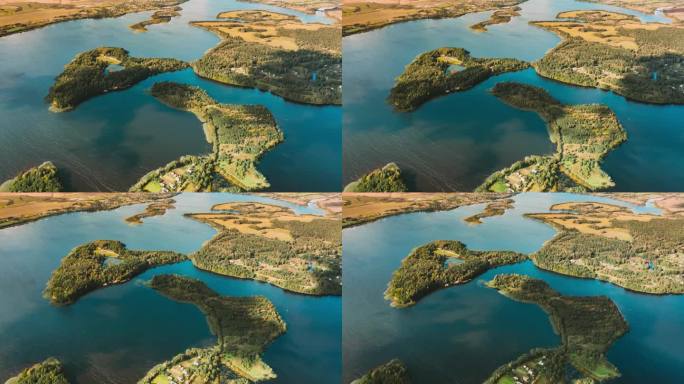 延时无人机延时超延时4K鸟瞰图在夏天的早晨湖上的岛屿。Lepel湖。从高处俯瞰欧洲自然，莱佩尔湖，别