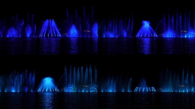 湖中美丽的喷泉，彩灯闪烁。