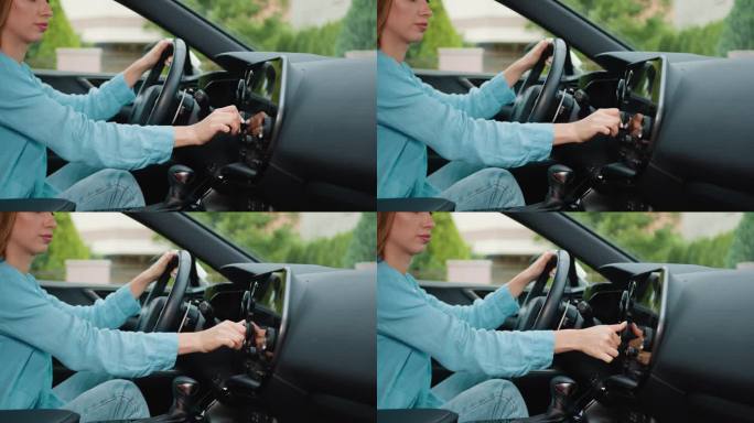一位女士在车内用触摸屏设置导航gps应用程序的特写镜头。