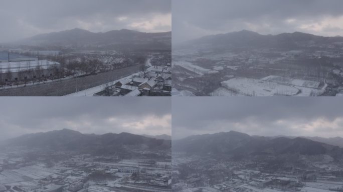 山村下雪的乡村雪景航拍