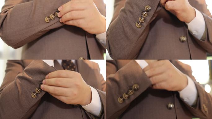 结婚婚礼新郎白色衬衣整理袖口纽扣棕色西装