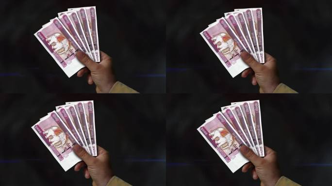 缅甸缅元钞票手里的扇子