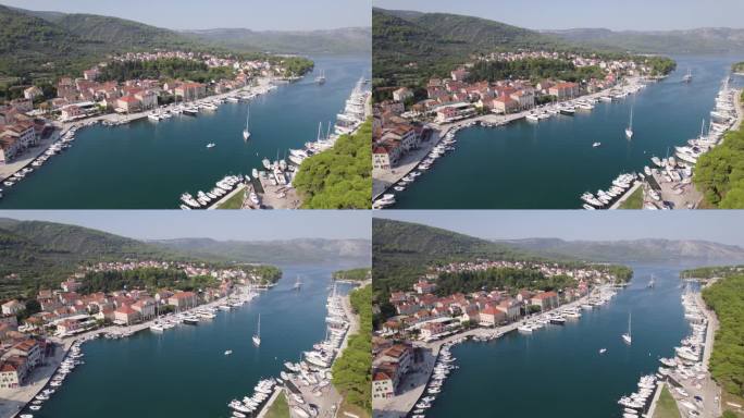克罗地亚，赫瓦尔岛，斯塔里格拉德湾的游艇和历史建筑