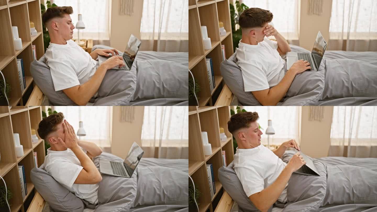 压力太大，长着大胡子的年轻白人坐在床上，因为工作过度而心烦，在卧室里使用笔记本电脑，室内的早晨场景有