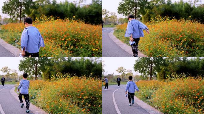 快乐的男孩在公园秋游赏花慢镜头