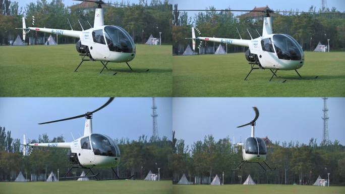 草坪上的直升机悬停旋转起飞