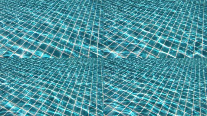 在湛蓝透明的泳池下潜水，近距离观看4K动态场景