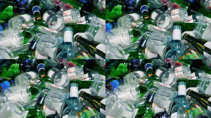 玻璃回收堆混合瓶子和罐子
