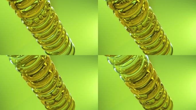 从花和物质的天然油作为黄金长生不老药级联在一个螺旋运动。