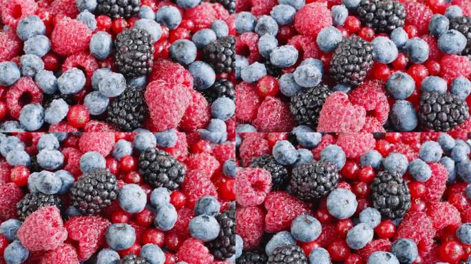 图案:新鲜的覆盆子，黑莓，蓝莓，红醋栗旋转上视图。健康的水果浆果。新鲜水果小吃。维生素k夏季概念