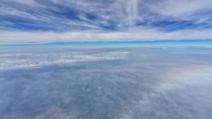 飞机窗外的云景陆地风光