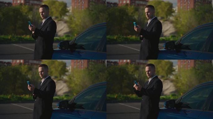 一位穿着大衣的优雅商人站在他的高档轿车旁，用智能手机解决家庭和工作问题。