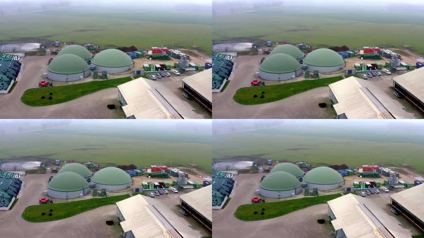 从空中俯瞰沼气生产工厂。从家庭、农业和食品工业废物中获取沼气(生物甲烷)。高品质的4k ProRes