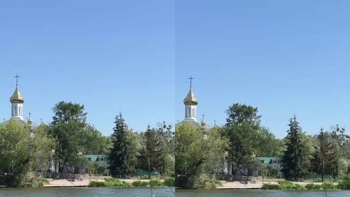文尼察的路堤上的基辅桥教堂绿芦苇清澈的水，南虫蓝天乌克兰和平时期