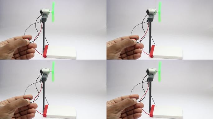 在运行状态下使用简单电子设备制作的小风扇。由电池供电的迷你风扇工作模型