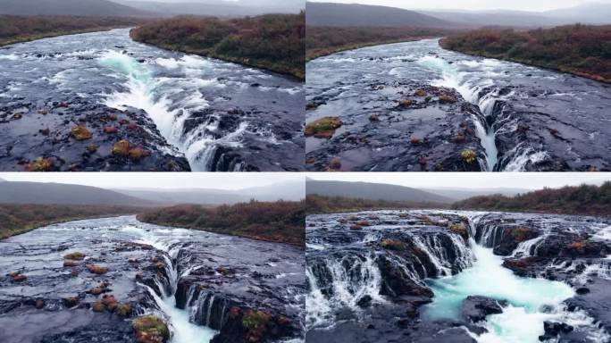 航拍:冰岛南部的布拉福斯瀑布(Brúarfoss)从黄金圈倾泻而下。它的风景如画，美丽的蓝色瀑布落入