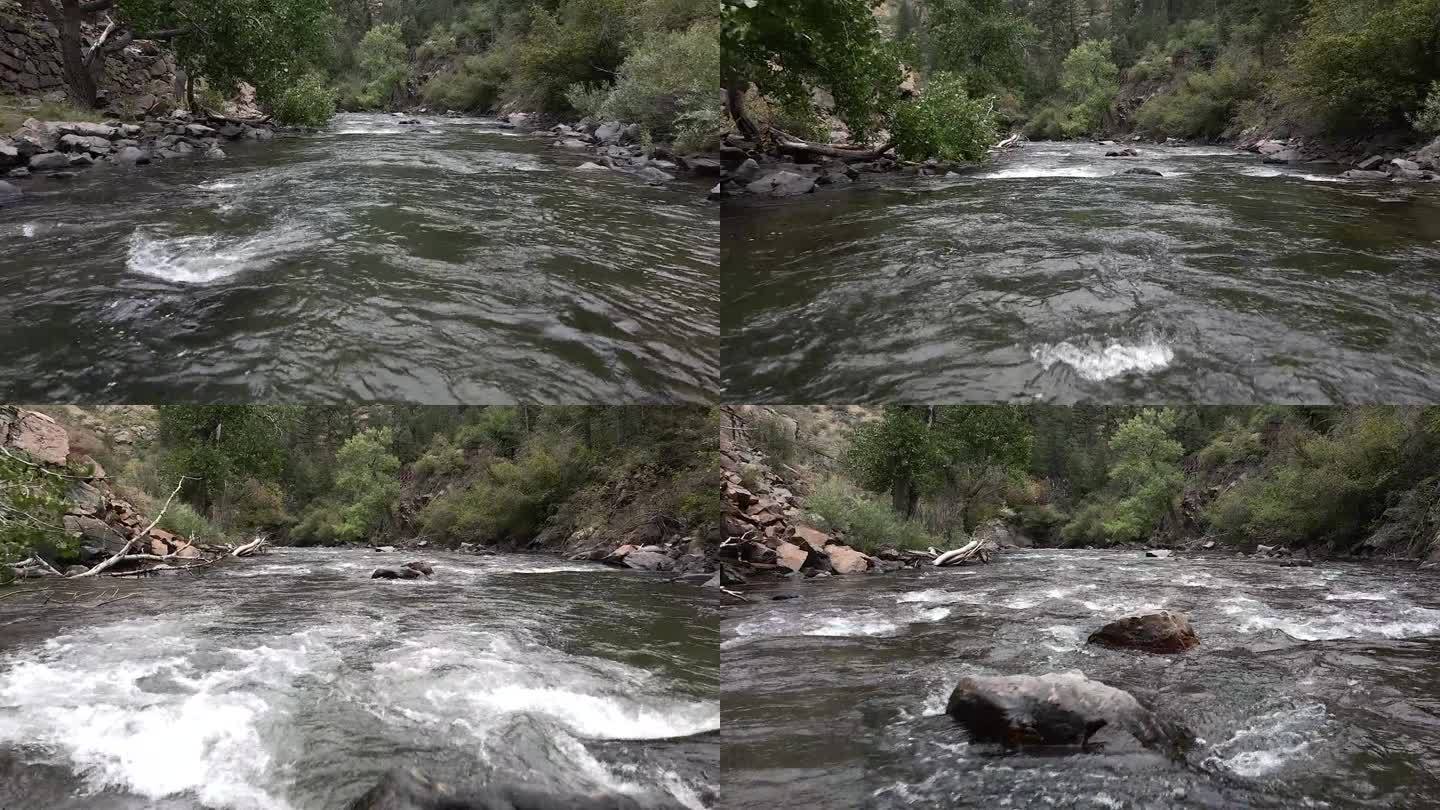 美国金色科罗拉多州的清溪峡谷湍急的溪流。无人机航拍