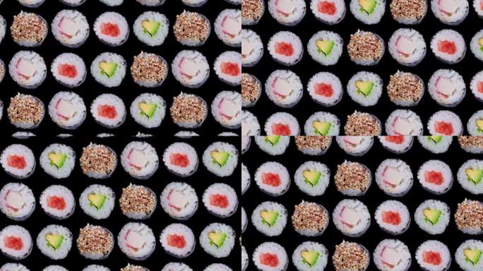 时尚的食物动画或背景旋转寿司卷在黑色的背景