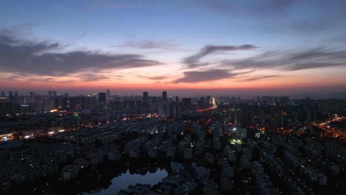 4K航拍山东省日照市日落晚霞城市风景