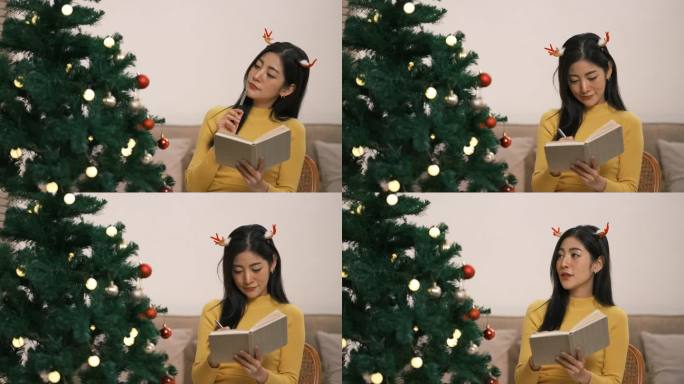 年轻的亚洲女子正在为即将到来的圣诞节做笔记。