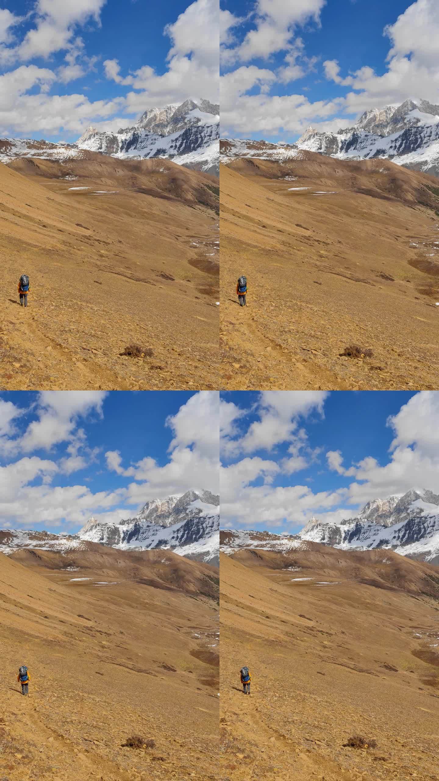 攀登横断山脉勒多曼因雪山的登山者徒步进山