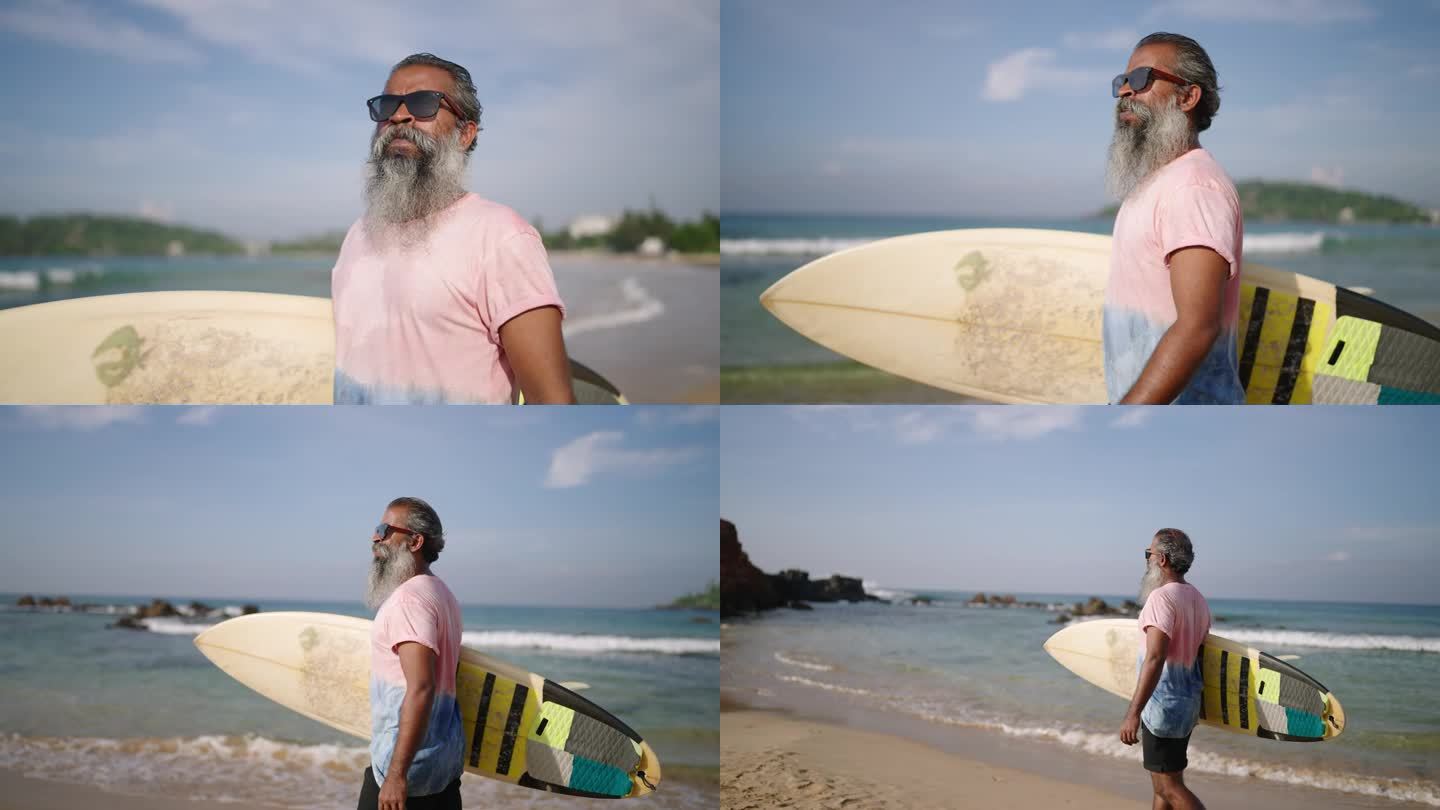 资深旅行者冲浪手拿着冲浪板，在热带岛屿上的异国海滩散步。退休的黑胡子老头戴着墨镜，喜欢旅游，欣赏大海