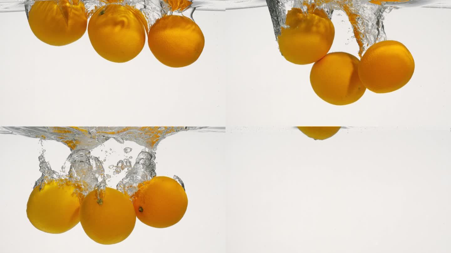 橙子落入水中慢镜头合集