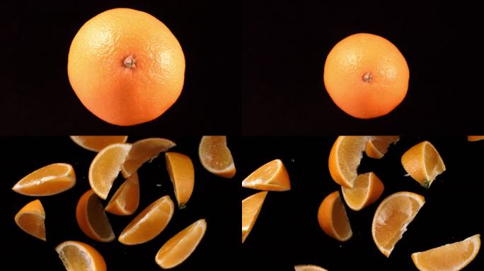 橙子在黑背景中落下爆炸成橙子飞起