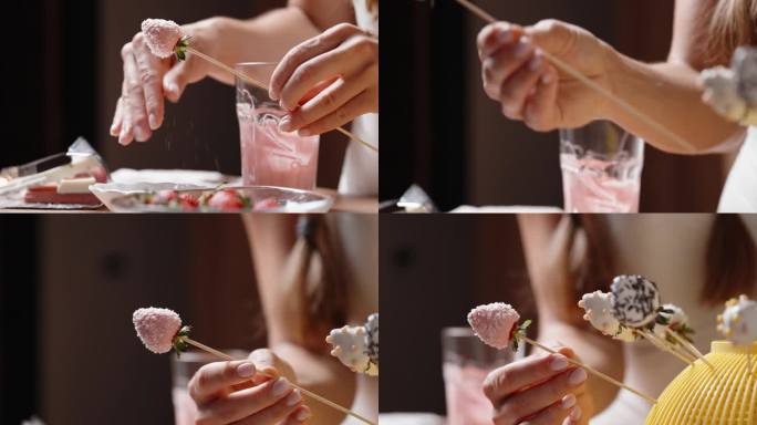 把草莓蘸上粉色巧克力，摇匀，去掉多余的椰子片，然后和现成的草莓放在一起。