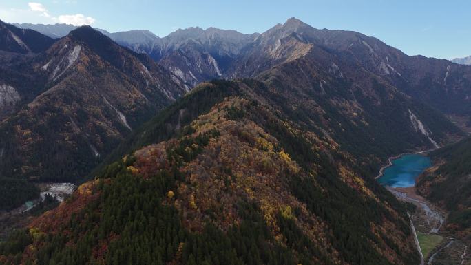 航拍四川九寨沟诺日朗瀑布五花海山脉彩林