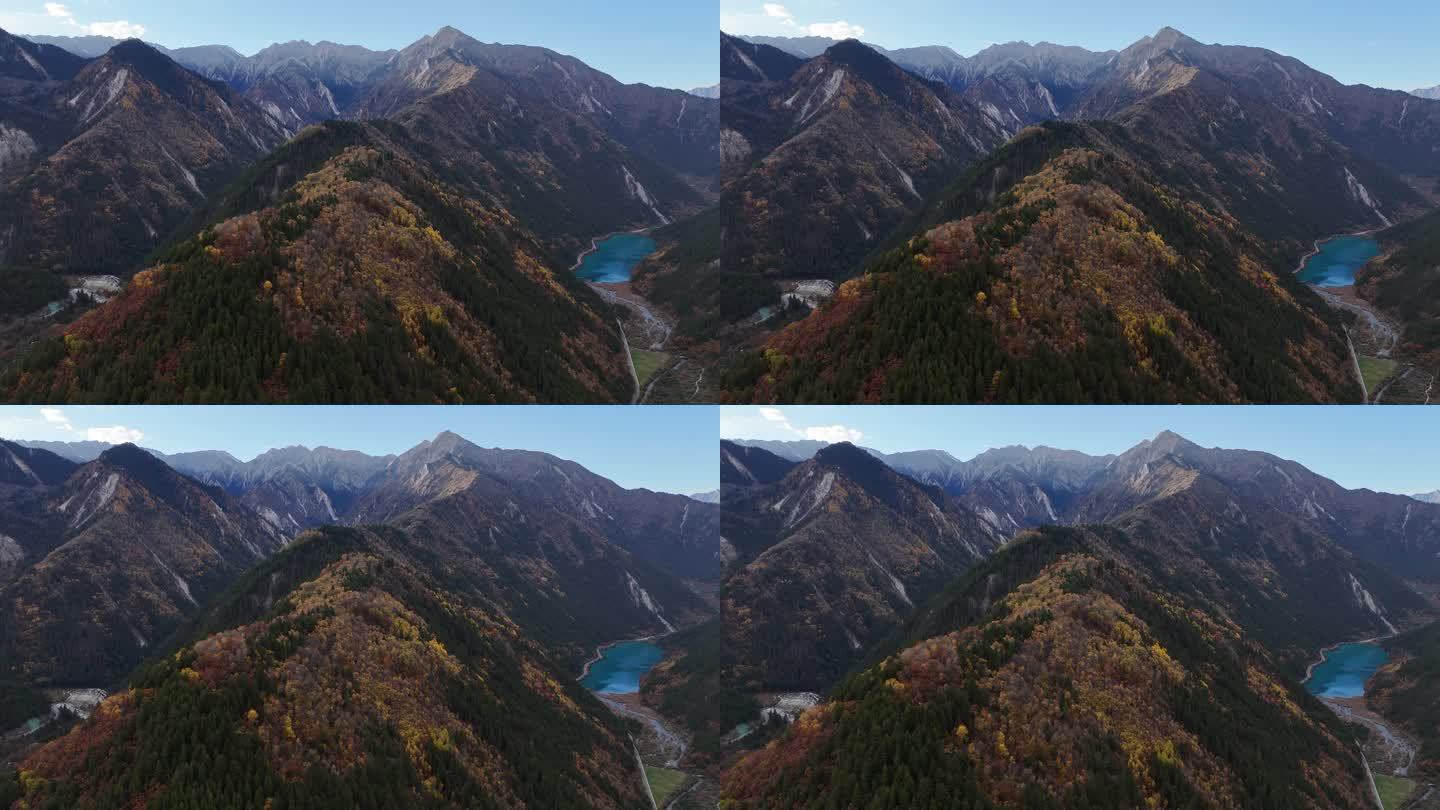 航拍四川九寨沟诺日朗瀑布五花海山脉彩林