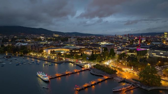 暮色夜照明苏黎世市中心湖滨湾码头航拍全景延时4k瑞士