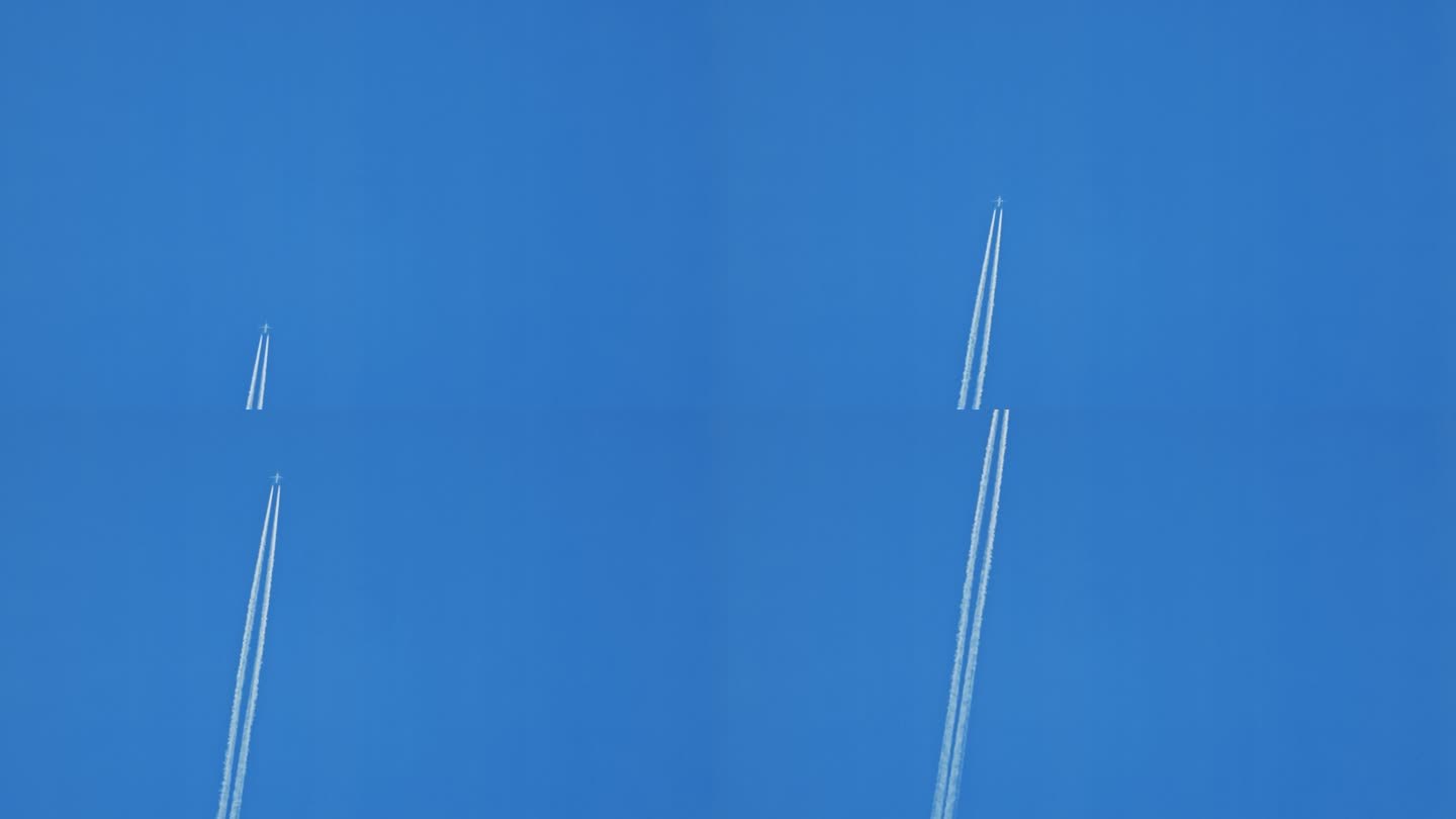 正下方的飞机在清澈的蓝天中直行时留下了水汽的痕迹