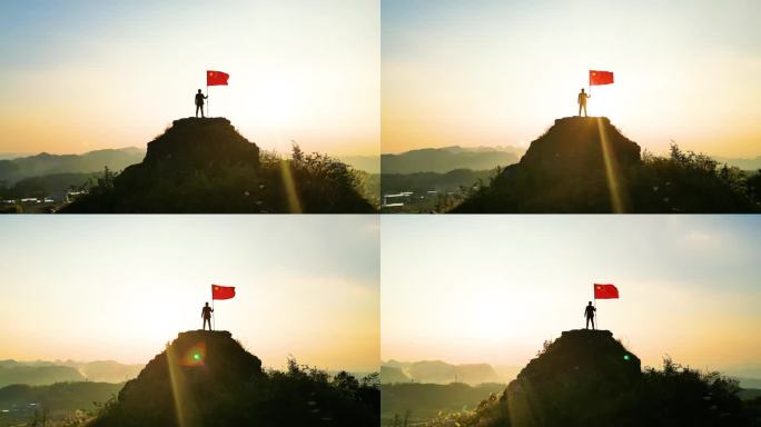 山顶举起红旗青年站在山顶举起五星红旗爱国