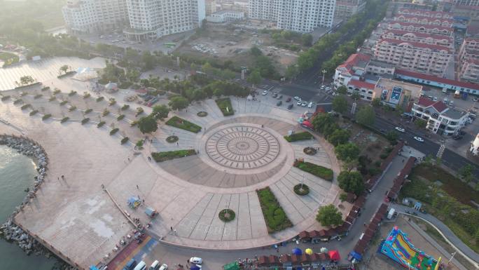 海边沿海城市沙滩海浪渔船航拍