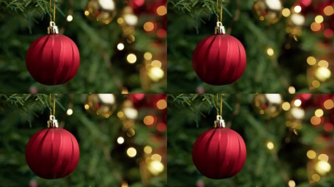 红色圣诞球挂在树上与复制空间