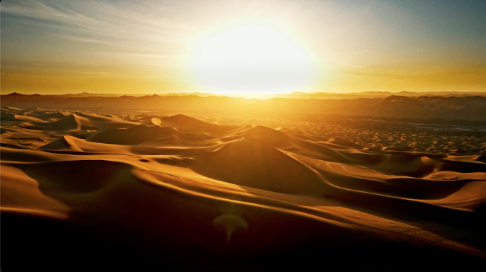 夕阳浩瀚沙漠落日沙漠沙山大景航拍