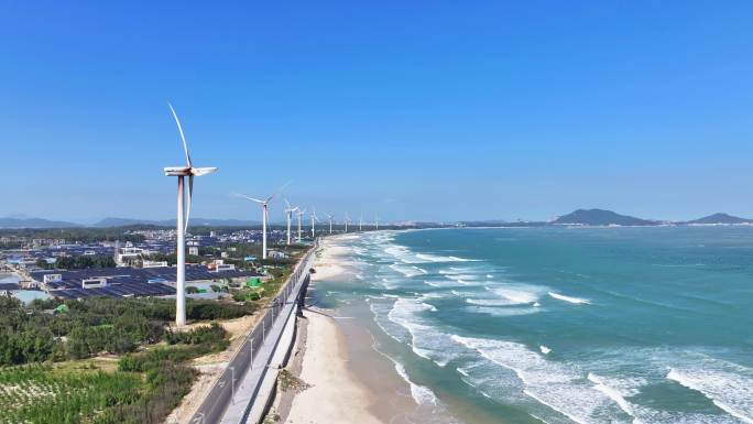 航拍福建漳州东山岛海岸新能源风力发电