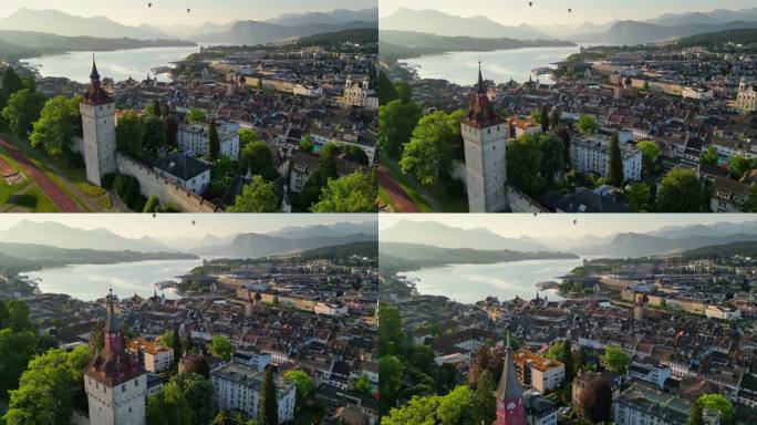 瑞士卢塞恩的瞭望塔和城墙。卢塞恩老城区和罗伊斯河的鸟瞰图。背景是瑞士阿尔卑斯山